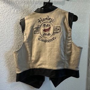 Vintage Harley Davidson vest with tags.